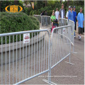 Fence outside concert crowd control barrier